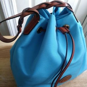 Canvas drawstring Dooney bag with wristlet